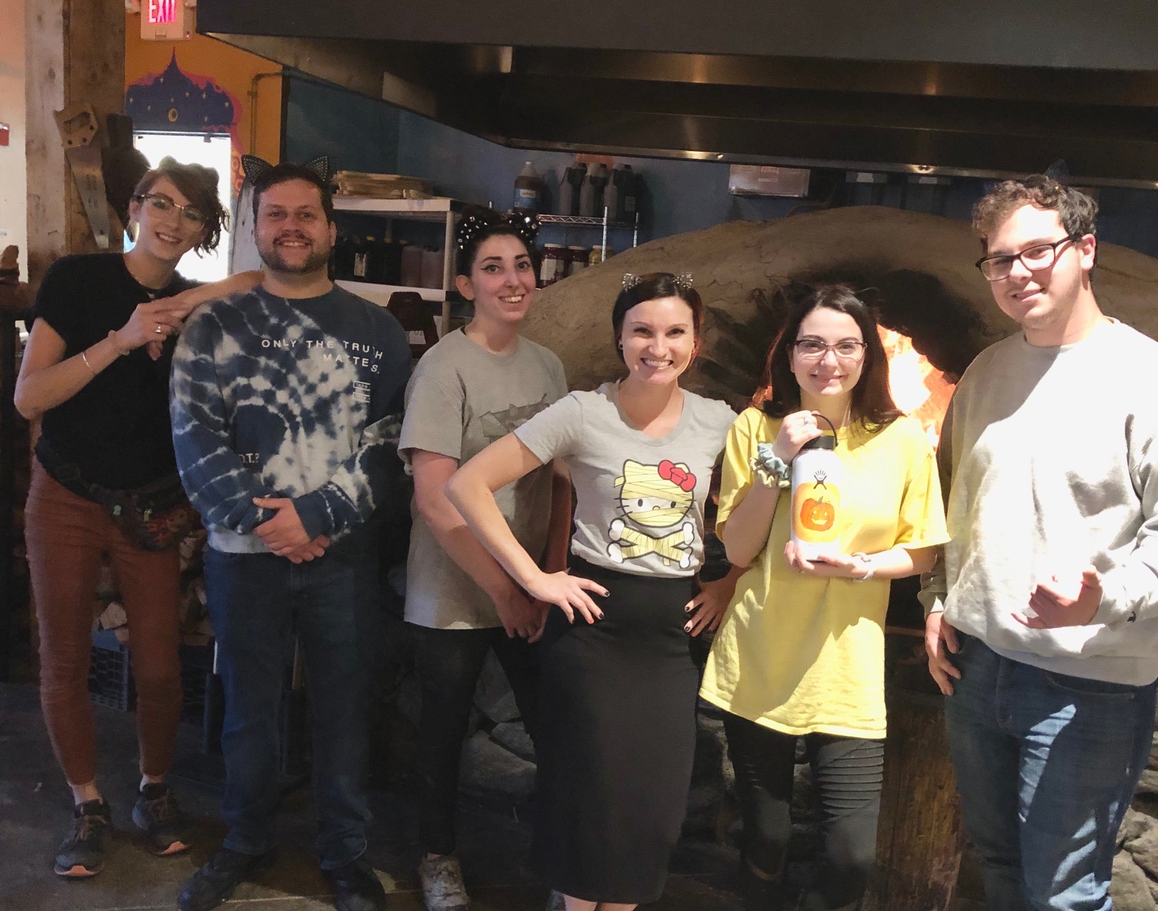 Group of Bedford Employees in front of Earth Oven